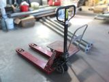 a picture of a forklift sitting in a warehouse
