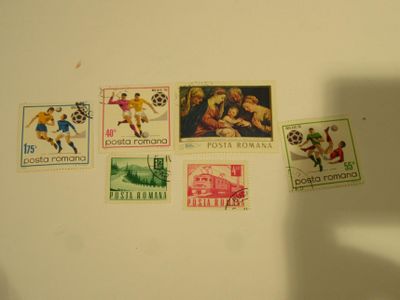 a lot of stamps on the wall of a room
