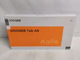 the box of the dogee tab a9 tablet is sitting on a white surface