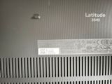 a close up of a laptop with a label on it