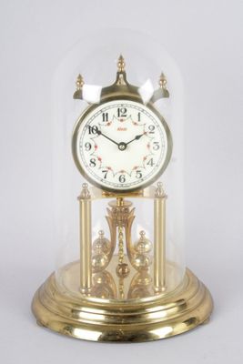 pendule KUNDO en laiton, sous globe en verre, h. totale 31 cm - Photo 1