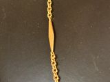 a close up of a necklace on a mannequin mannequin mannequin mannequin mannequin mannequin mannequin mannequin