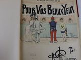 un livre avec l'image d'un homme et d'un chien