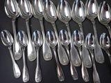 a lot of spoons and spoon spoons on the table