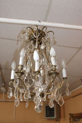 a chandelier hanging from the ceiling in a room
