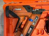an orange tool box with a stapler and a stapler in it