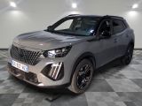 the silver suv is parked on a checkered floor in the garage
