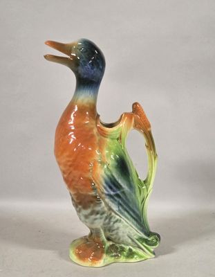 a colorful bird that is sitting on a table