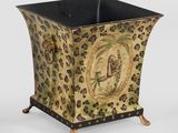 leopard print planter with a gold and black base