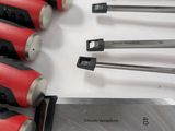 a lot of tools that are sitting on a table
