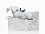 statue of a white horse with a green saddle on a white background