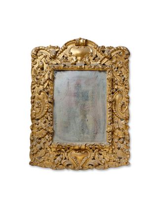 a picture of a gold frame with a picture in it