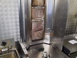 an image of a commercial kitchen with a deep fryer