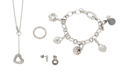 a necklace, bracelet, and earring set on a white background