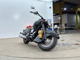 a motorcycle that is parked inside of a building