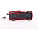 a toy train that is sitting on a white surface