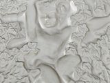 a white plate with a picture of a monkey on it