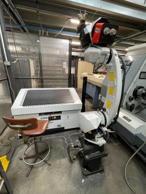 an image of a machine in a factory with a solar panel on it