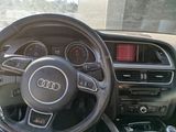 steering wheel and dashboard of a car with various gauges and gauges