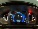 the dashboard of a car with a digital display on it