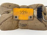 a bag that has a tag attached to it