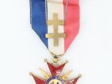 an image of a medal with a cross on it
