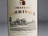 a bottle of wine that is sitting on a table