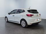 the rear end of a white car in a white room