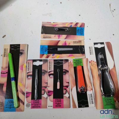 a lot of different makeup products on the table