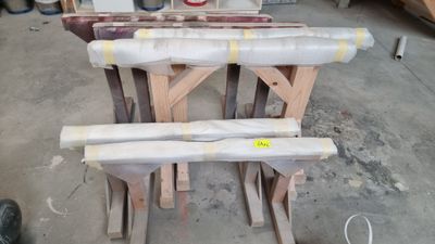 several pieces of wood are stacked on top of each other