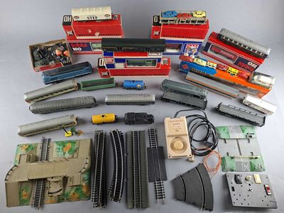 many different types of toy trains and accessories on the table