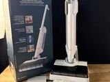 a picture of a box with a vacuum cleaner on it