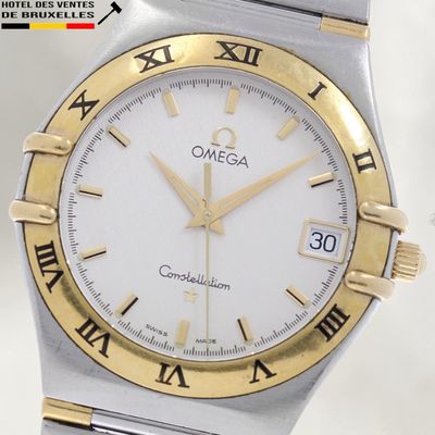 an image of a close up of a wrist watch with roman numerals