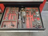 many tools in the drawer of a tool box