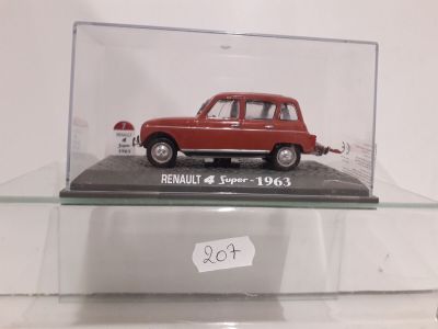 a red car in a glass display case on a shelf