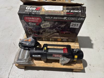 a box and a winch on a pallet with a box in the background