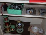 a shelf with various items on it in a room