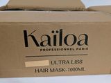 two boxes of hair masks on a white surface