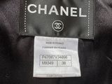 the label on a chanel jacket is clearly visible