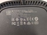 a close up of a black power cord connected to a computer mouse