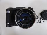 a picture of a camera with a lens attached to it