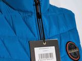 the back of a blue jacket with a label on it