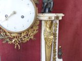 a clock that is sitting on top of a table