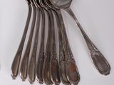 a lot of spoons and spoon spoons on the table
