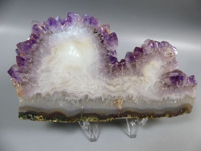 a picture of a piece of amethorate with ice crystals