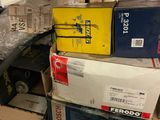 a lot of boxes stacked on top of each other on a shelf