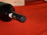 a bottle of wine that is sitting on a table