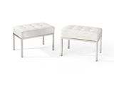 pair of white leather stools with chrome legs on white background