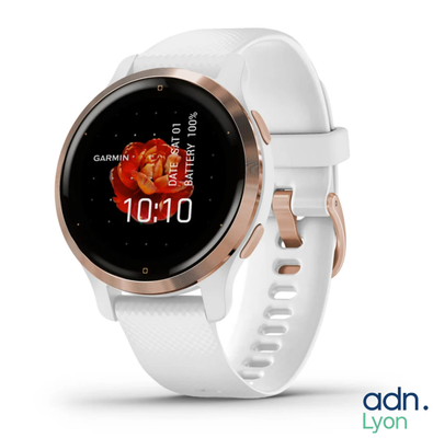 a close up of a smart watch on a white surface