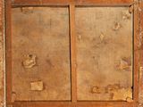 an old wooden cabinet with two doors and two drawers